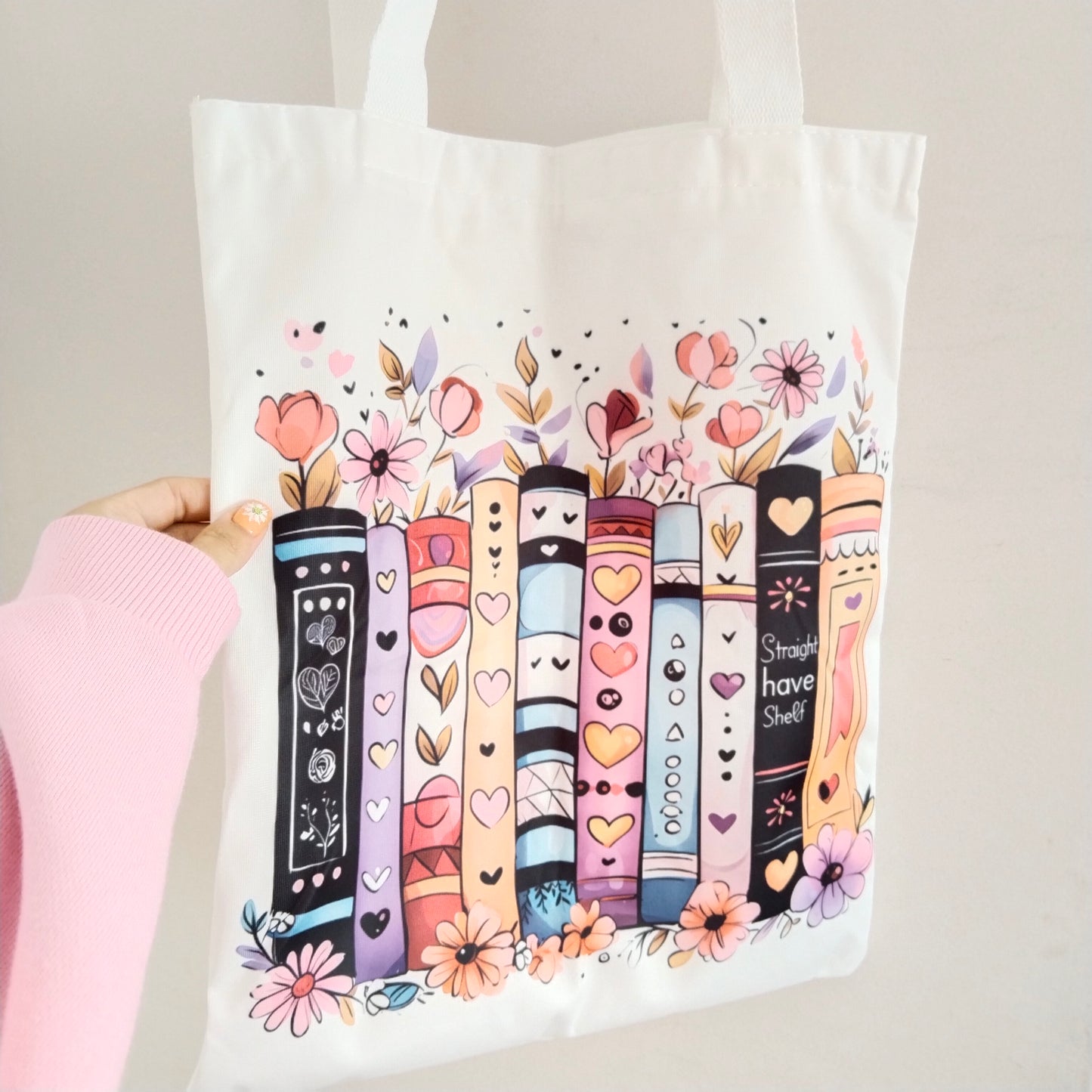 Bolsa de tela libros entre flores