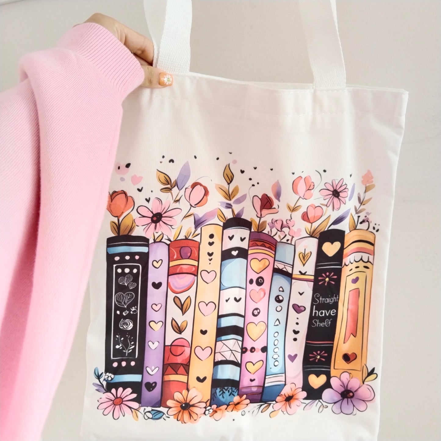 Bolsa de tela libros entre flores