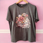Camiseta libros y flores