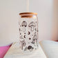 Vaso de cristal setas entre estrellas y lunas