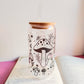 Vaso de cristal setas entre estrellas y lunas